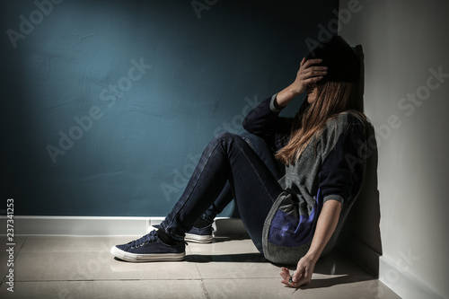 Female junkie with syringe ...