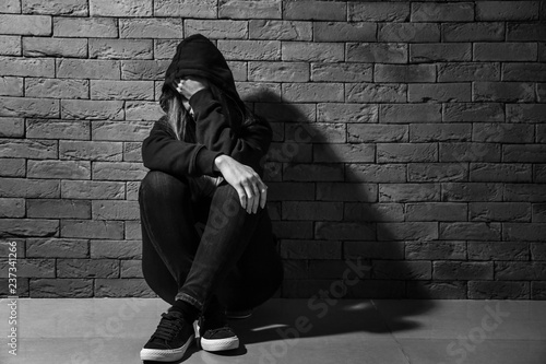 Depressed female junkie nea...
