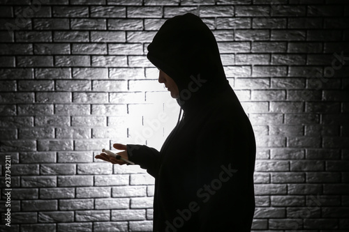 Female junkie with syringe ...