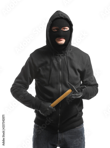 Male thief with hammer on white background
