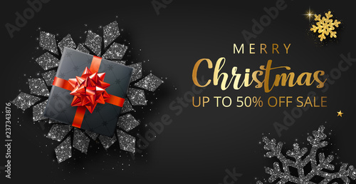 Merry Christmas promo poster with top view gift and shiny snowflakes.