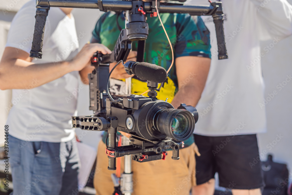 camera operator, director and dp discuss the process of a commercial video shoot camera operator, director and dp discuss the process of a commercial video shoot