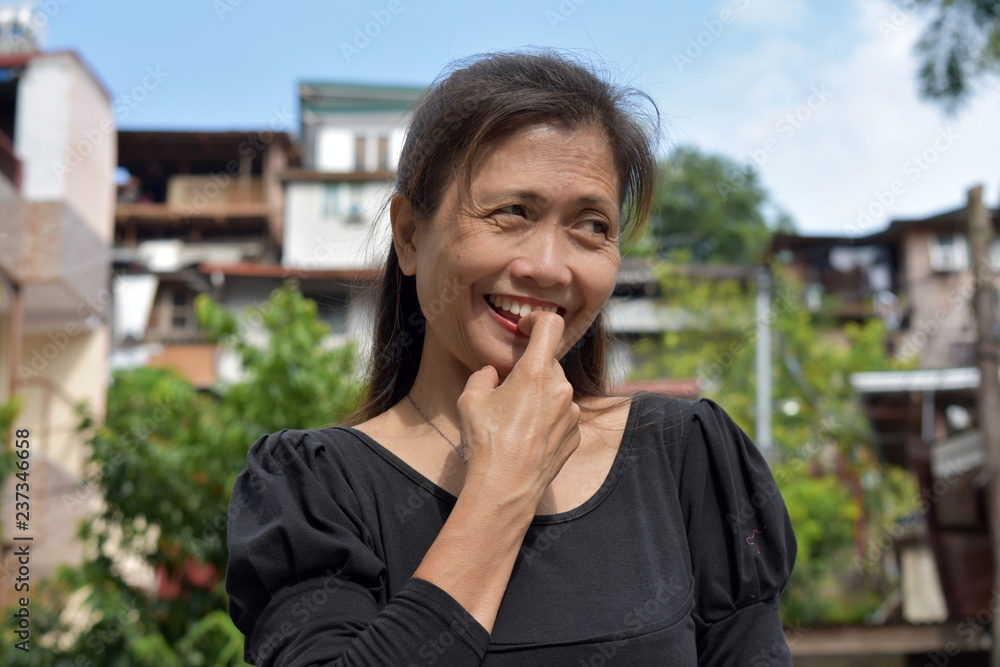 Thoughtful Filipina Female Senior Thoughtful Filipina Female Senior