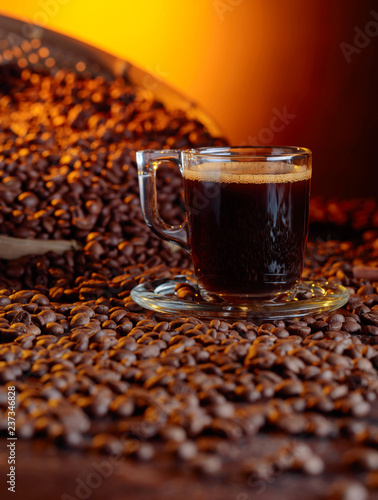 Espresso coffee cup with coffee beans.