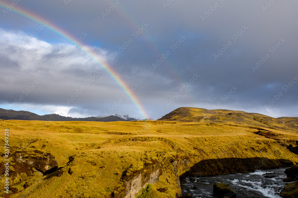 Rainbow over the mountains of Iceland