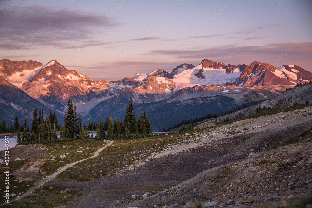 Alpine glow shining on the mountains in Whistler, BC, Canada