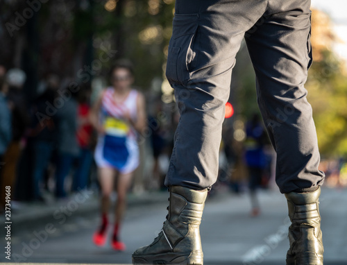 Security member guard and street with runners