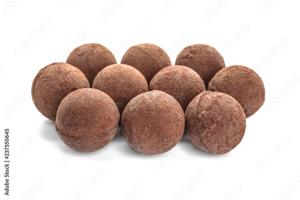 Tasty chocolate truffles on white background Tasty chocolate truffles on white background