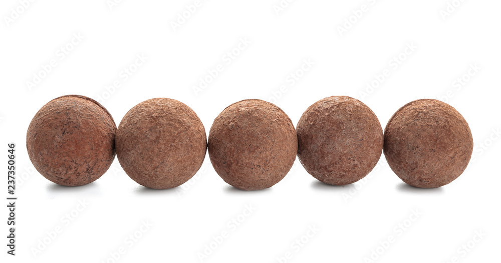 Tasty chocolate truffles on white background Tasty chocolate truffles on white background