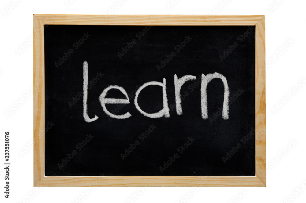 WOODEN FRAMED BLACK BOARD WITH THE WORD LEARN WRITTEN WITH WHITE CHALK WOODEN FRAMED BLACK BOARD WITH THE WORD LEARN WRITTEN WITH WHITE CHALK