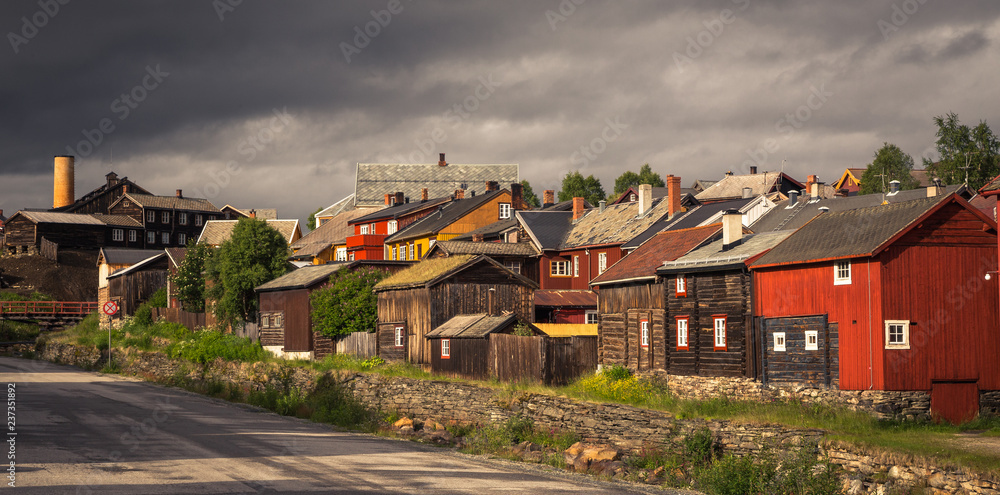 Old street architecture of mining town Roros in Norway.
