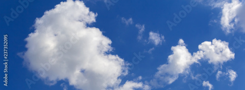 blur white clouds against a blue sky