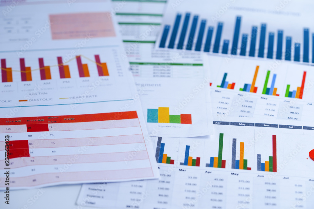 Charts Graphs spreadsheet paper. Financial development, Banking Account, Statistics, Investment Analytic research data economy, Stock exchange trading, Business office company meeting concept. Charts Graphs spreadsheet paper. Financial development, Banking Account, Statistics, Investment Analytic research data economy, Stock exchange trading, Business office company meeting concept.