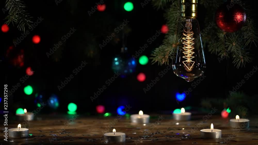 Christmas tree and toys on the table are candles on the front of the plan, the bulb turns on and off Christmas tree and toys on the table are candles on the front of the plan, the bulb turns on and off