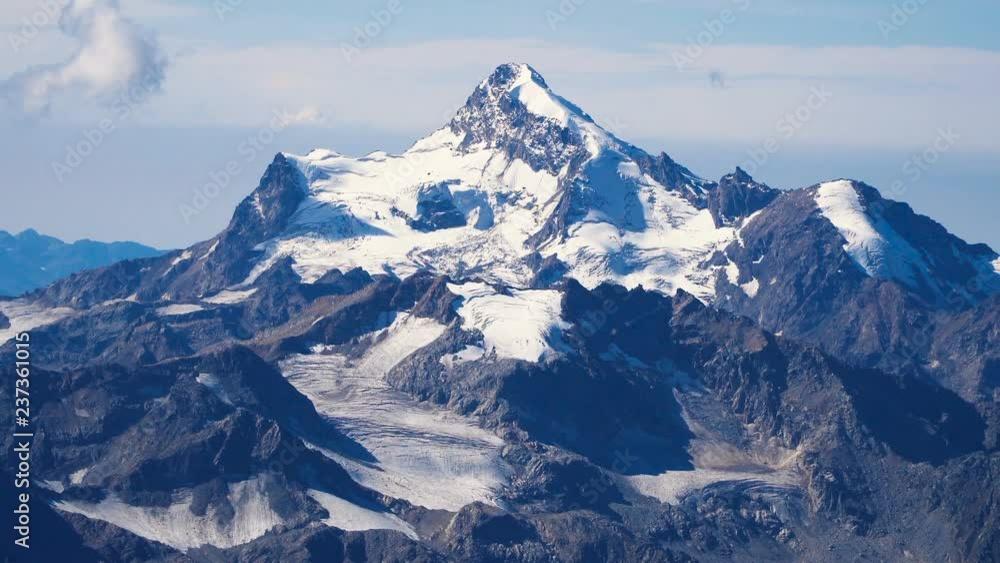 Beautifull landscape view of snow peaks of Caucasus mountains near mount Elbrus - the highest mountain in Europe Beautifull landscape view of snow peaks of Caucasus mountains near mount Elbrus - the highest mountain in Europe
