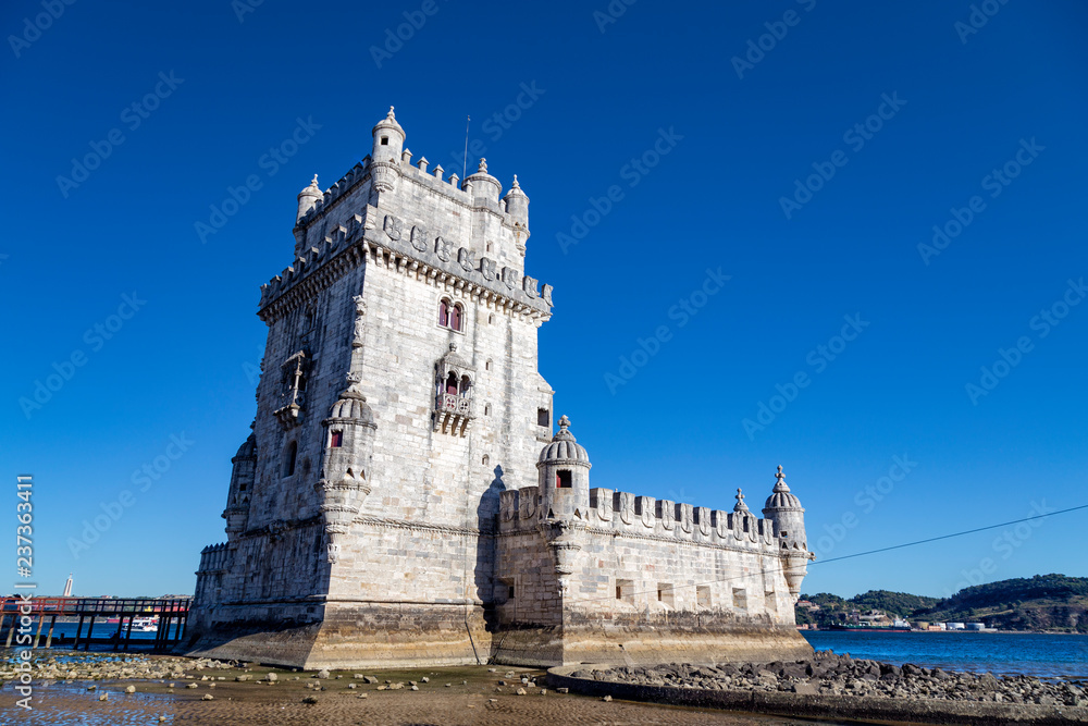 Summer sun hitting Belem Tower in Lisbon, Portugal.