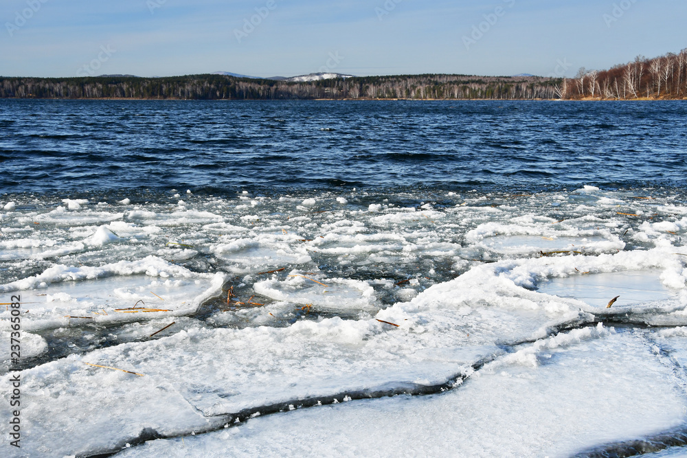 Southern Ural, Russia. Small ice floes on lake Uvildy in November