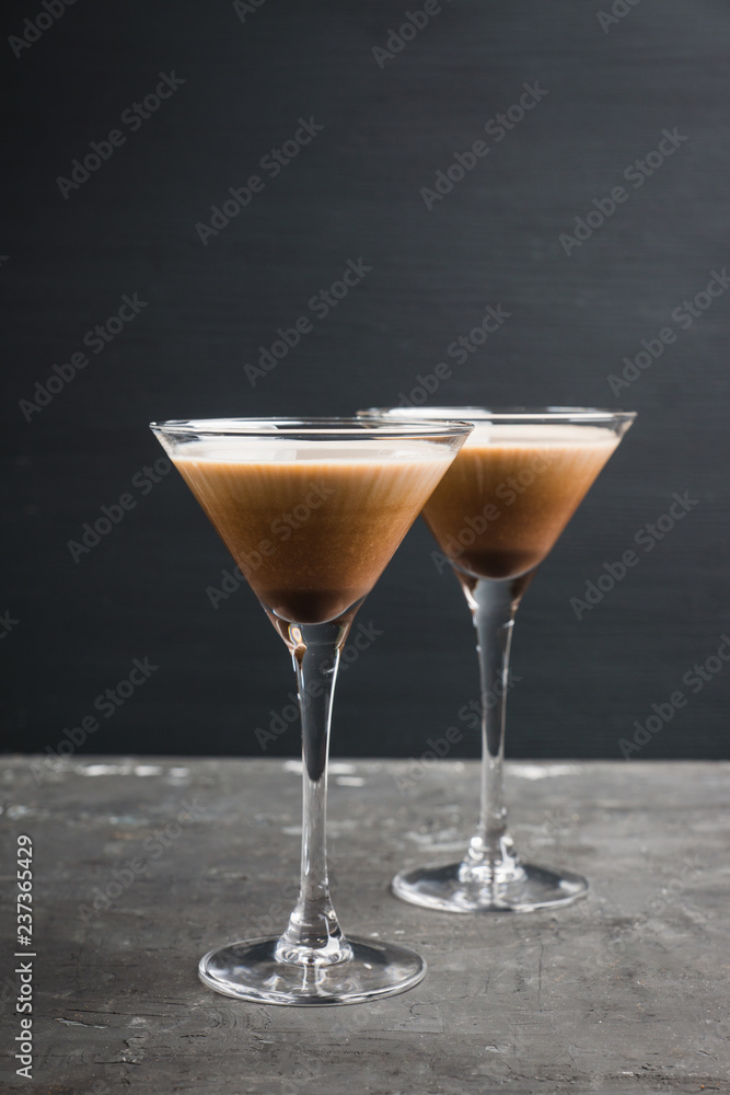 Chocolate martini with spices on the rustic background. Selective focus. Shallow depth of field. Chocolate martini with spices on the rustic background. Selective focus. Shallow depth of field.