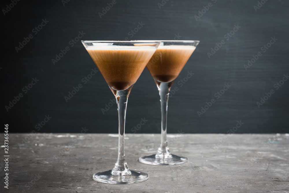 Chocolate martini with spices on the rustic background. Selective focus. Shallow depth of field.