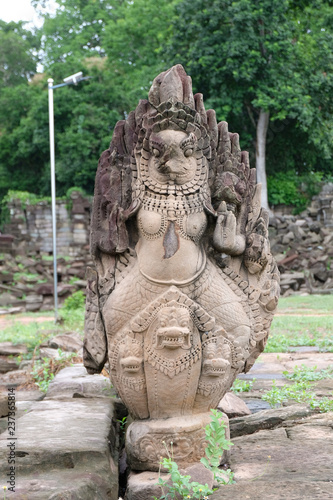 The carved of Garuda and the Serpent at Banteay Chhmar Castle photo