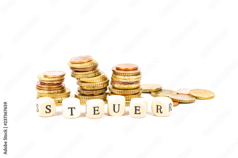 Stacked change with letters for the German word for taxes Stacked change with letters for the German word for taxes