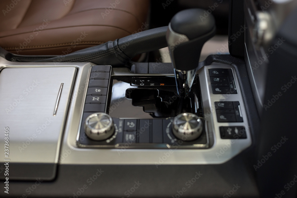 Fototapeta premium Interior of new car with automatic transmission. Modern and prestigious vehicles.