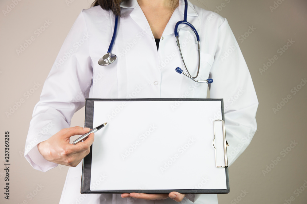 doctor's hands with a plane-table shows pen. Healthcare and medical concept doctor's hands with a plane-table shows pen. Healthcare and medical concept