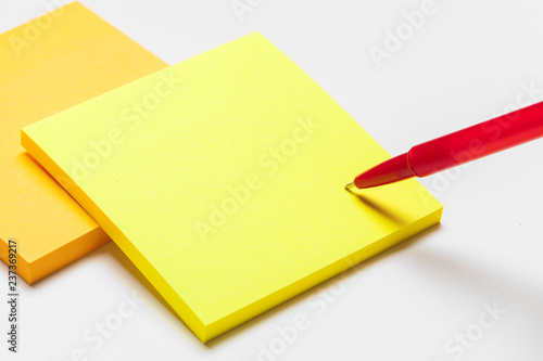 Blank memo pad note with pen close up © fotofabrika