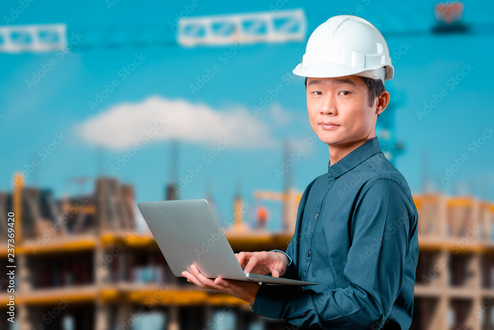 Man asian engineer with laptop