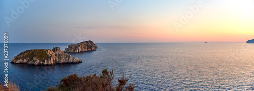 Spain. Mallorca. Sunset over the entrance to Santa Ponsa Bay photo