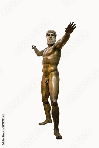 Fotografie Isolated bronze statue of Zeus or Poseidon in a white background
