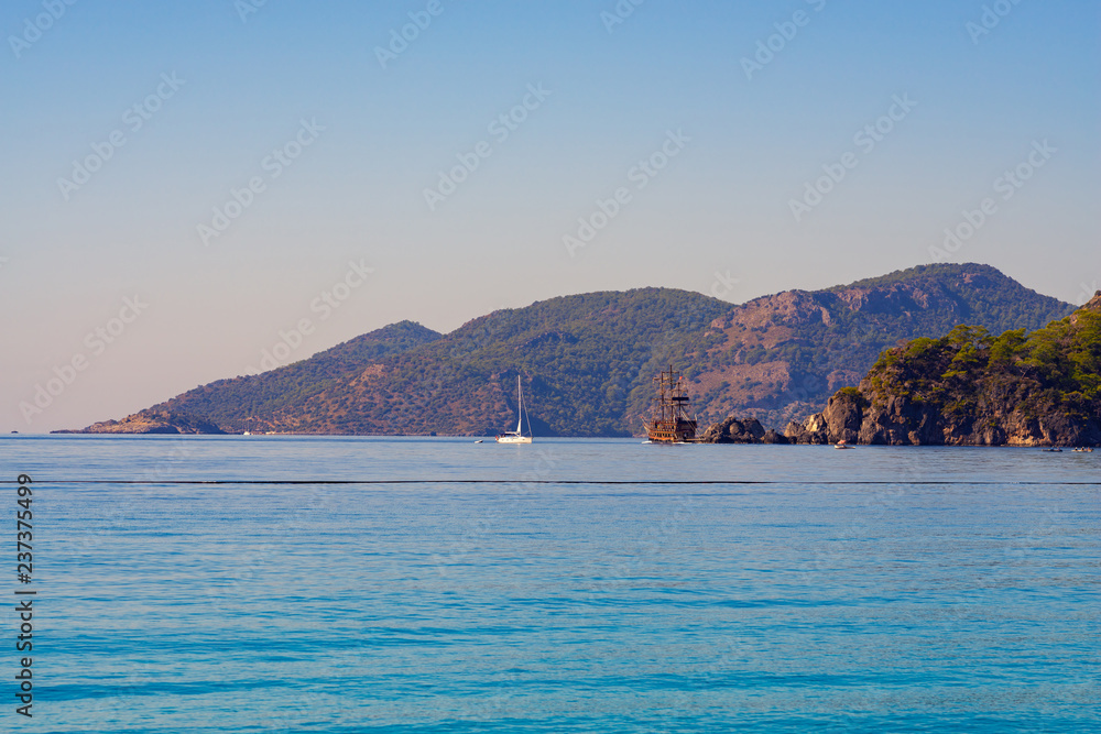 Turquoise waters of the Mediterranean Sea surrounded by rocky shores