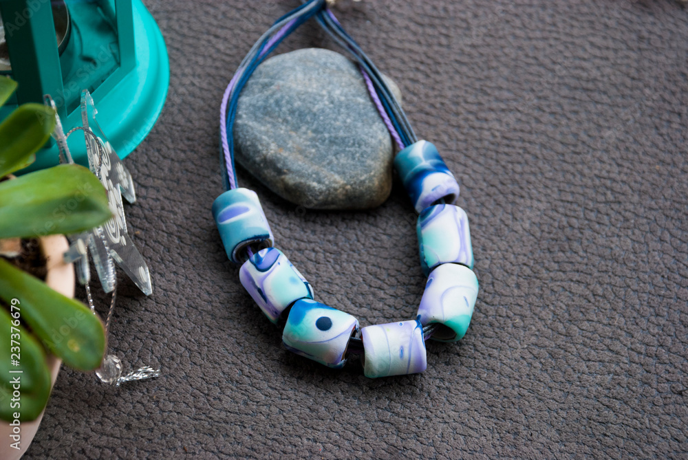 Handmade boho style blue winter beads necklace of polymer clay. Christmas  jewelry decor. Stock Photo | Adobe Stock