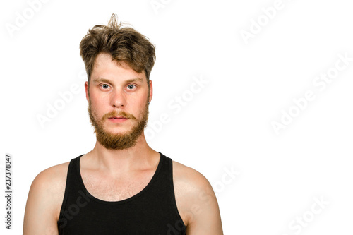 overgrown unshaven guy with a beard on a white isolated background