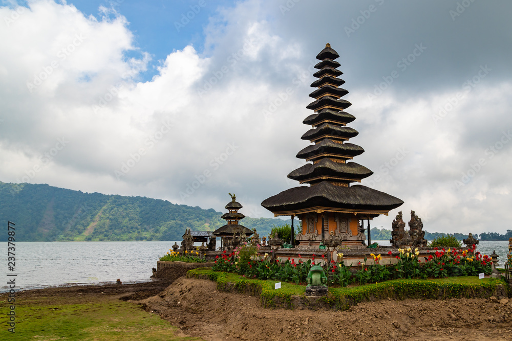 Pura Ulun Danu Beratan in cloudy day, famous temple on the lake, Bedugul, Bali, Indonesia. Pura Ulun Danu Beratan in cloudy day, famous temple on the lake, Bedugul, Bali, Indonesia.
