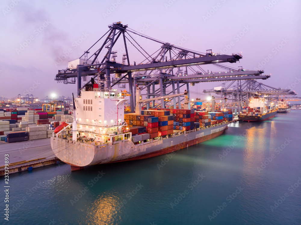 Cargo ship carrying container and smart crane loading big tank for