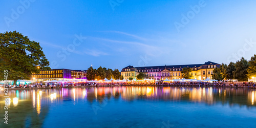 Germany, Stuttgart, palace garden, Eckensee, statehouse and New Castle during summer party photo