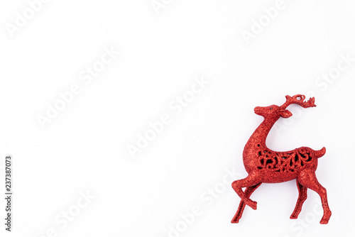 Christmas background concept. Top view of Red reindeer on white background.