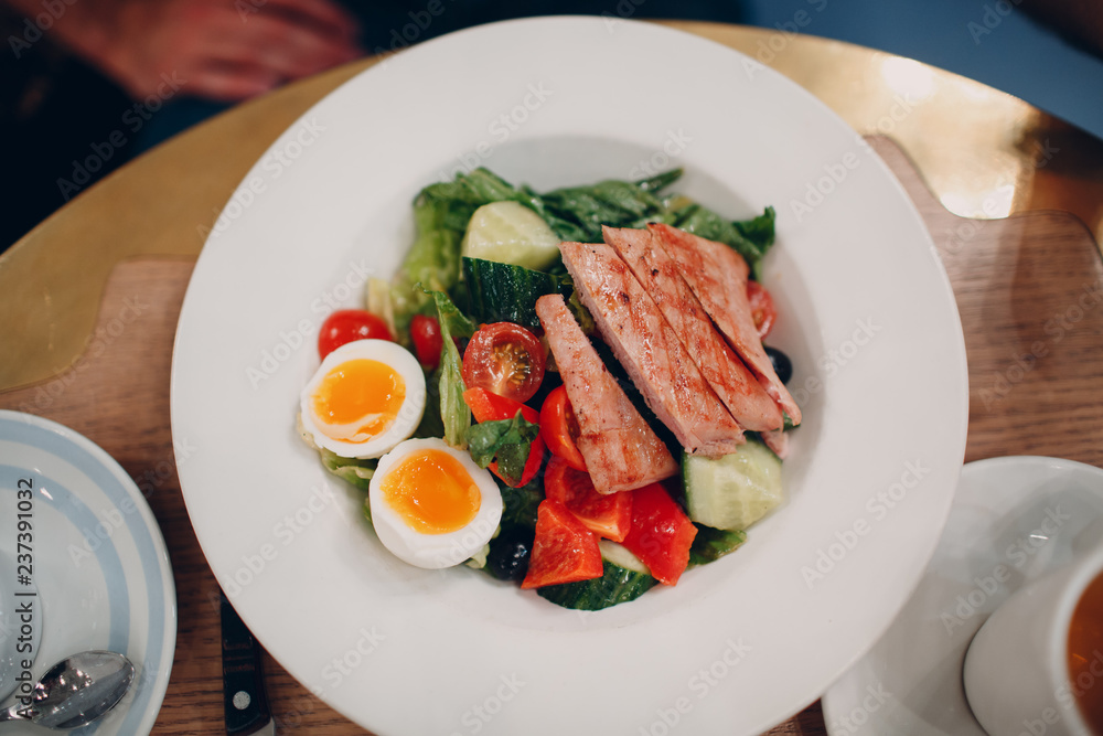 Tuna salad. Breakfast in English style on the table in the restaurant. Tuna salad. Breakfast in English style on the table in the restaurant.