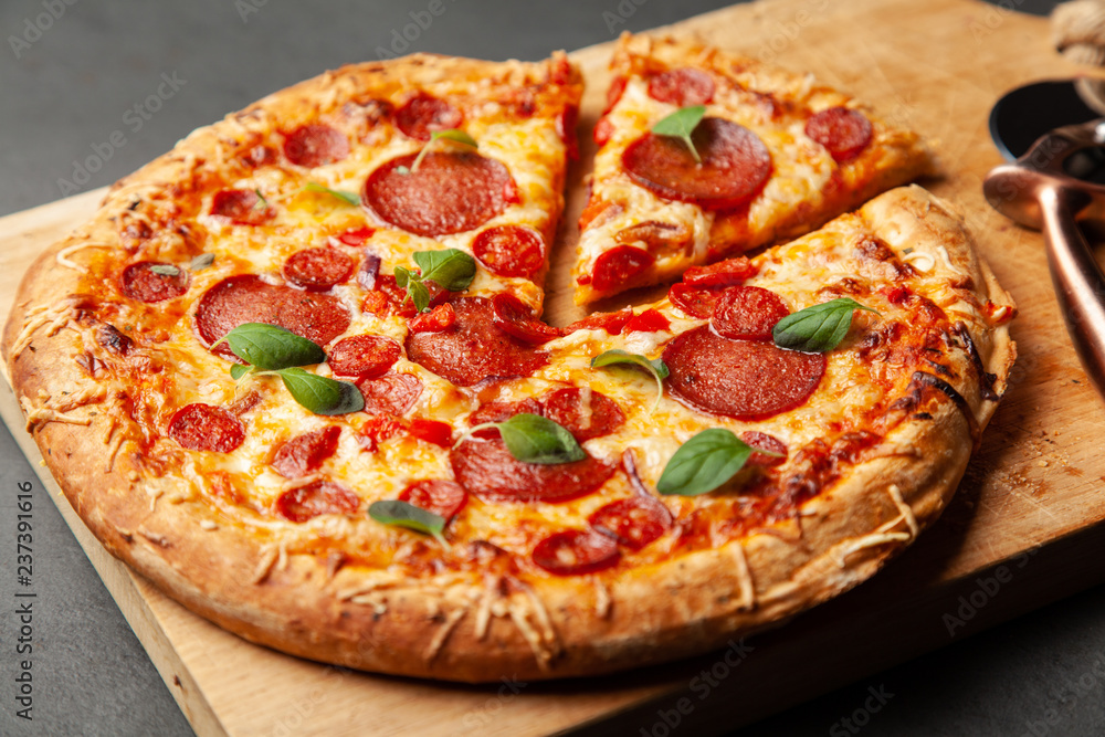 Pizza with salami and chorizo Pizza with salami and chorizo