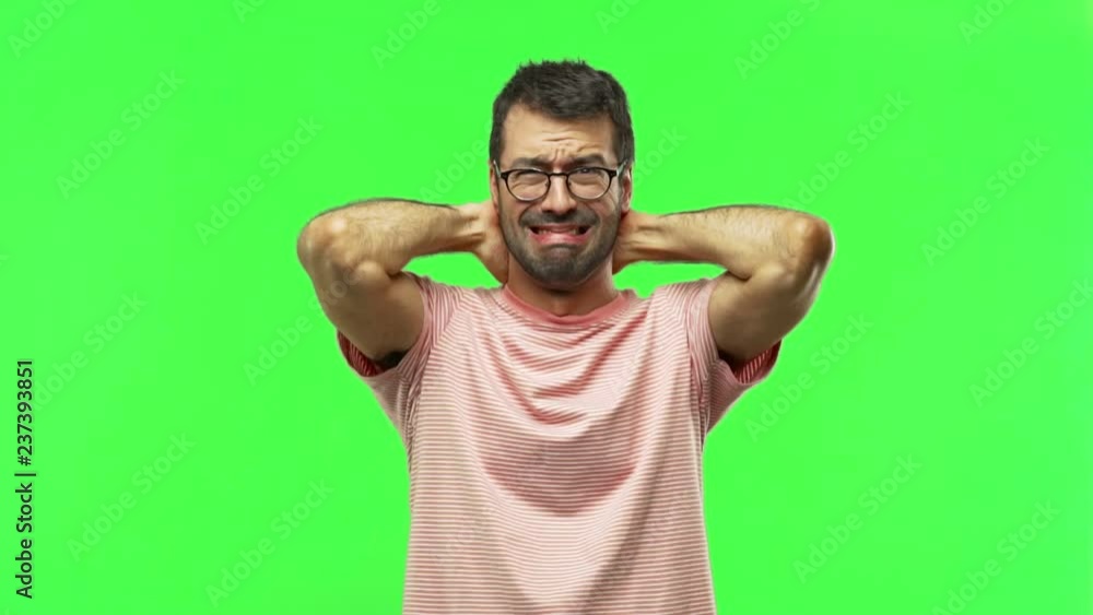 man takes hands on head because has migraine on green screen chroma key background man takes hands on head because has migraine on green screen chroma key background