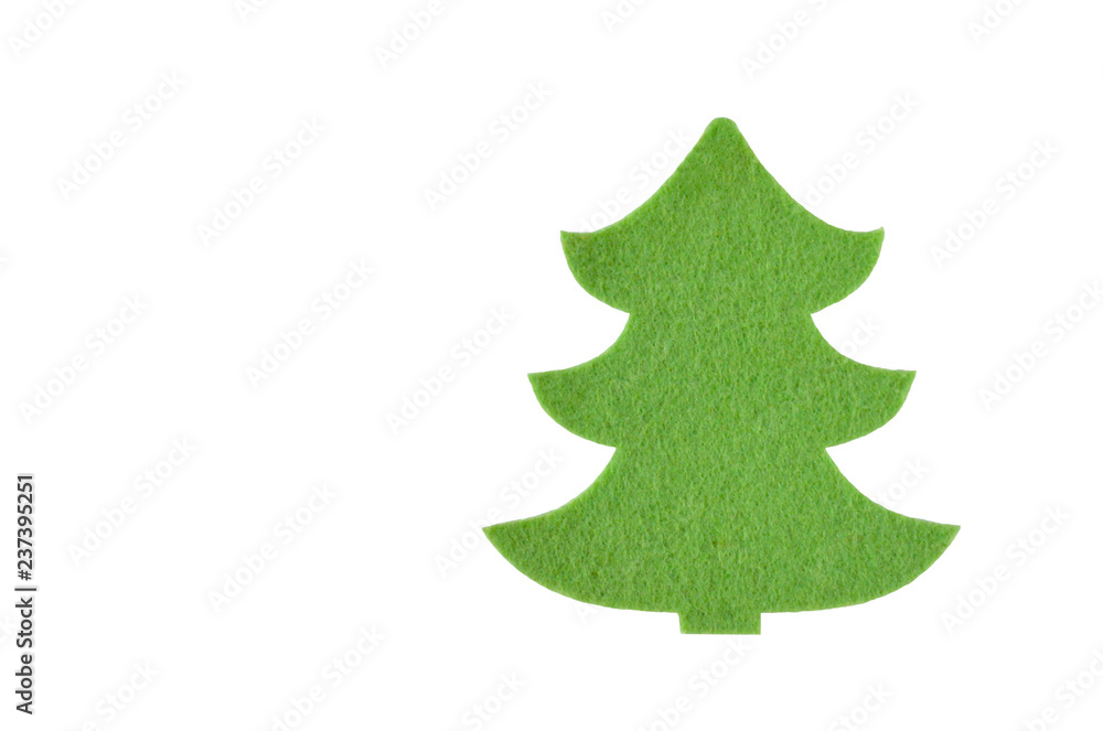 Isolated felt toy in the form of a Christmas tree on white background. Isolated felt toy in the form of a Christmas tree on white background.