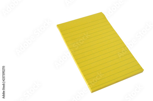 Isolated lined block of yellow paper on a white background. Notepad for notes.