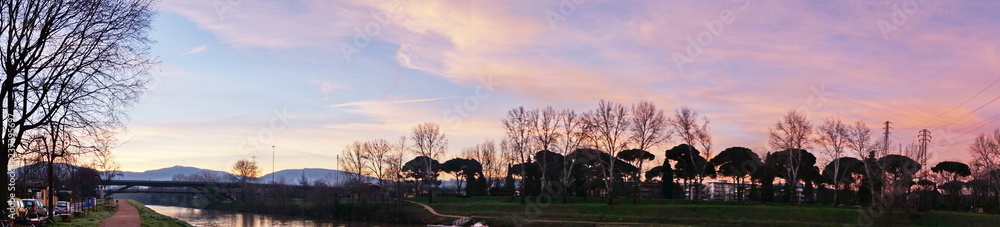 Visions walking along the Arno river, near Florence, at dawn Visions walking along the Arno river, near Florence, at dawn
