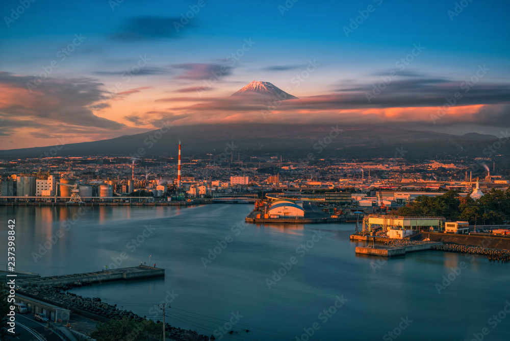Mt. Fuji with Japan industry zone at sunset Shizuoka prefecture, Japan.