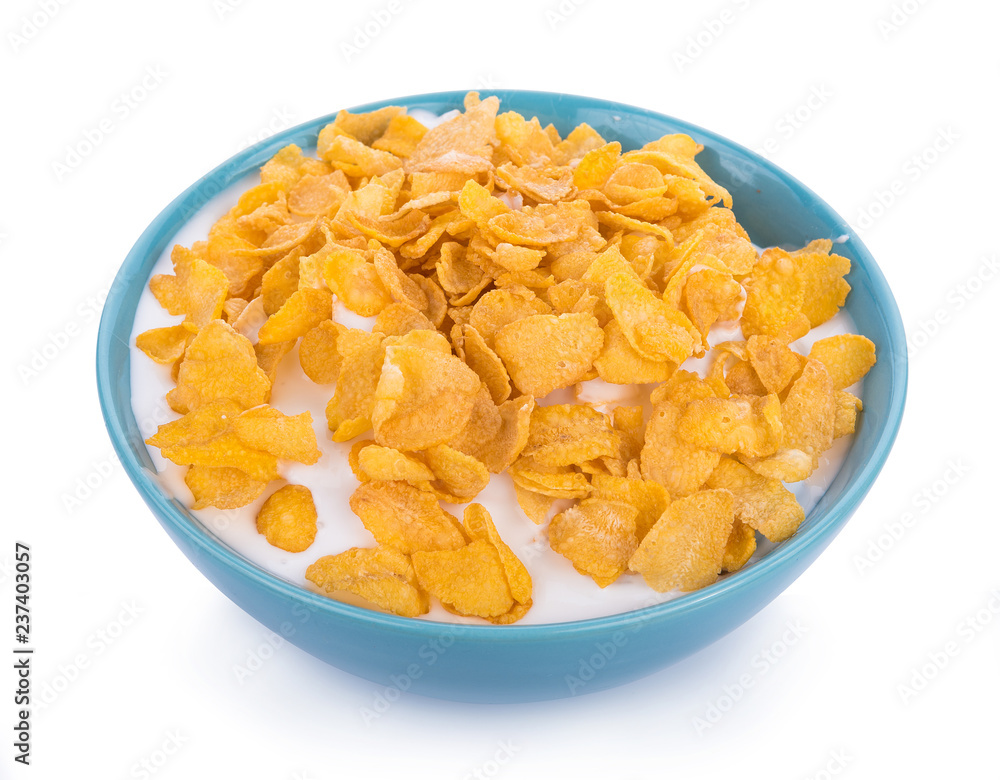 Corn flakes with milk in bowl isolated on white Corn flakes with milk in bowl isolated on white