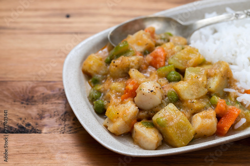 squid stew with boiled rice on dish