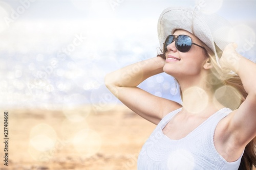 Outdoor summer portrait of pretty young smiling happy woman © BillionPhotos.com