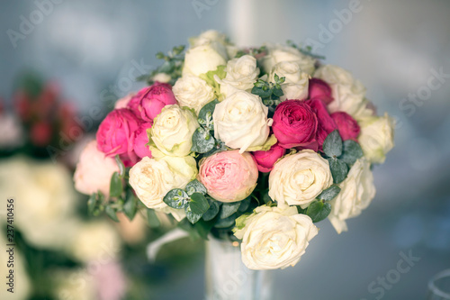 Wedding bouquet of roses on the dinner table close-up  DAVID AUSTIN.