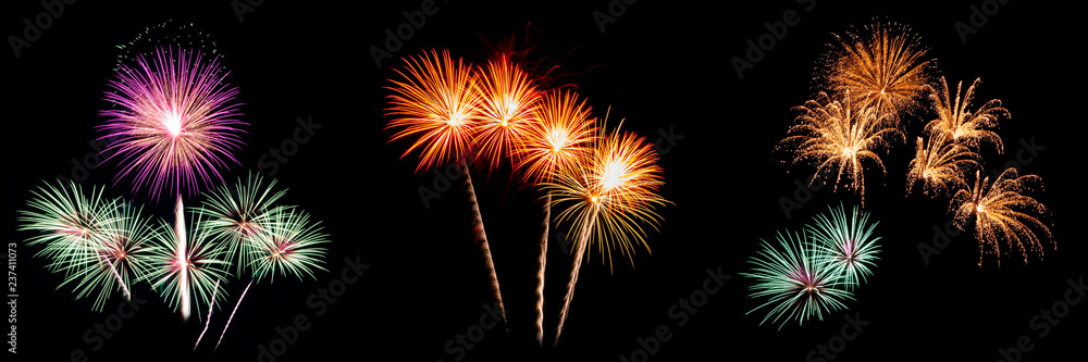 Three of fireworks light up on black background for celebration